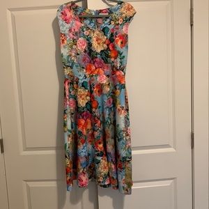 Beautiful floral dress that flows with ease and very feminine.